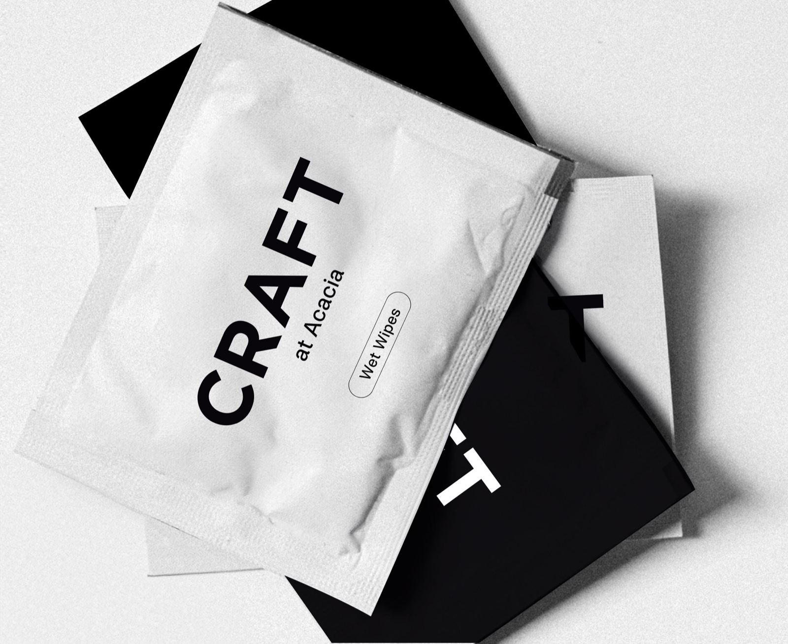 Craft wet wipe sachets on black and white card
