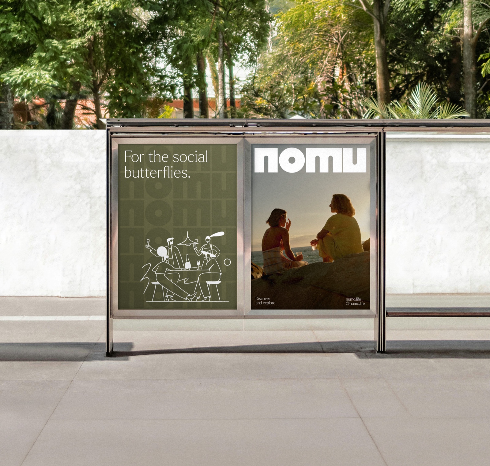 Two Nomu posters in a bus shelter
