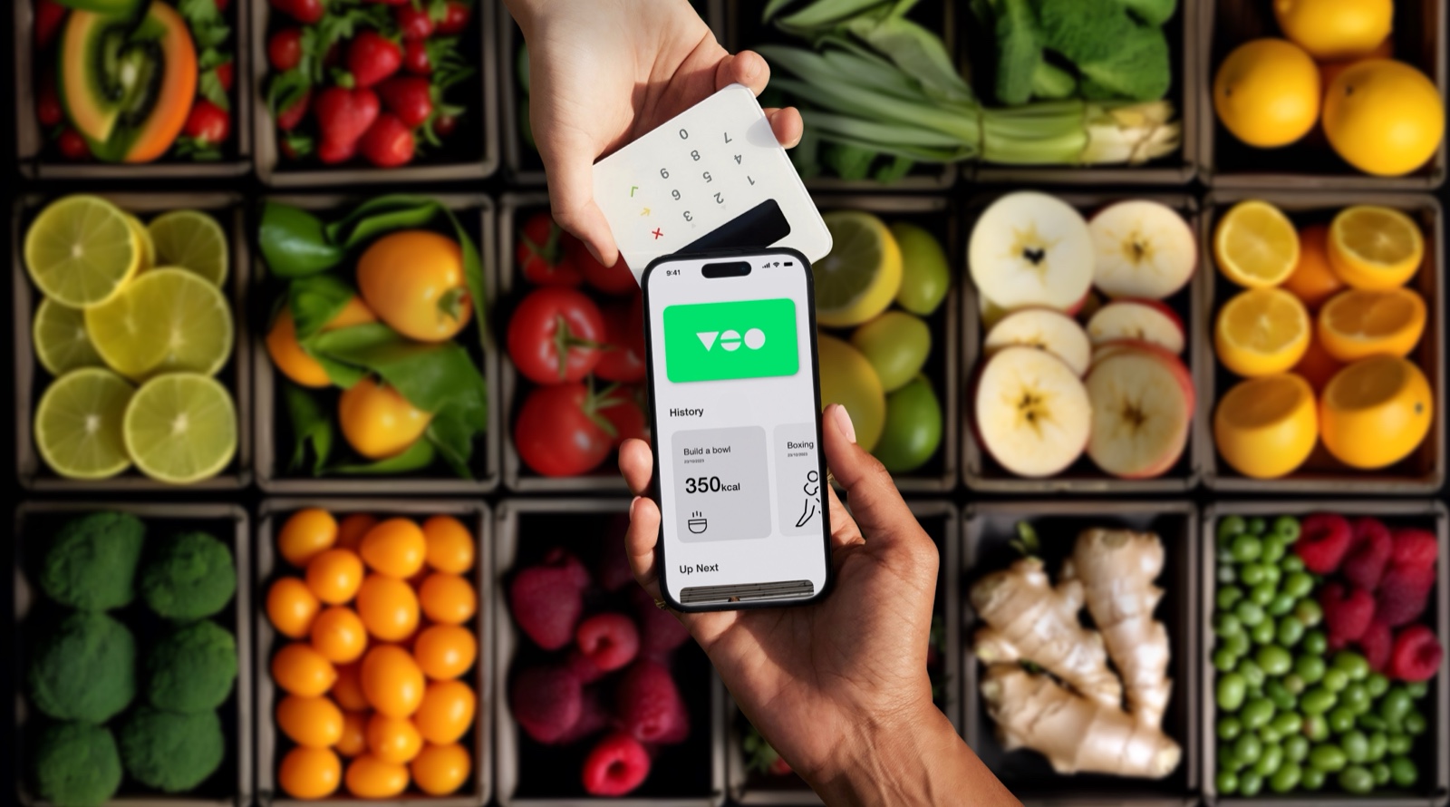Paying with the Veo app at a market stall